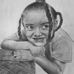 A young black female child with braids.